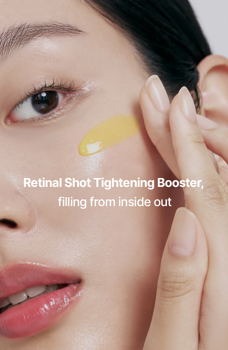 Close-up of a person applying a yellow cream to their face with text about a retinal shot tightening booster.
