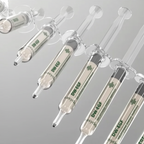 Multiple syringes with DW-EGF labels on a gray background